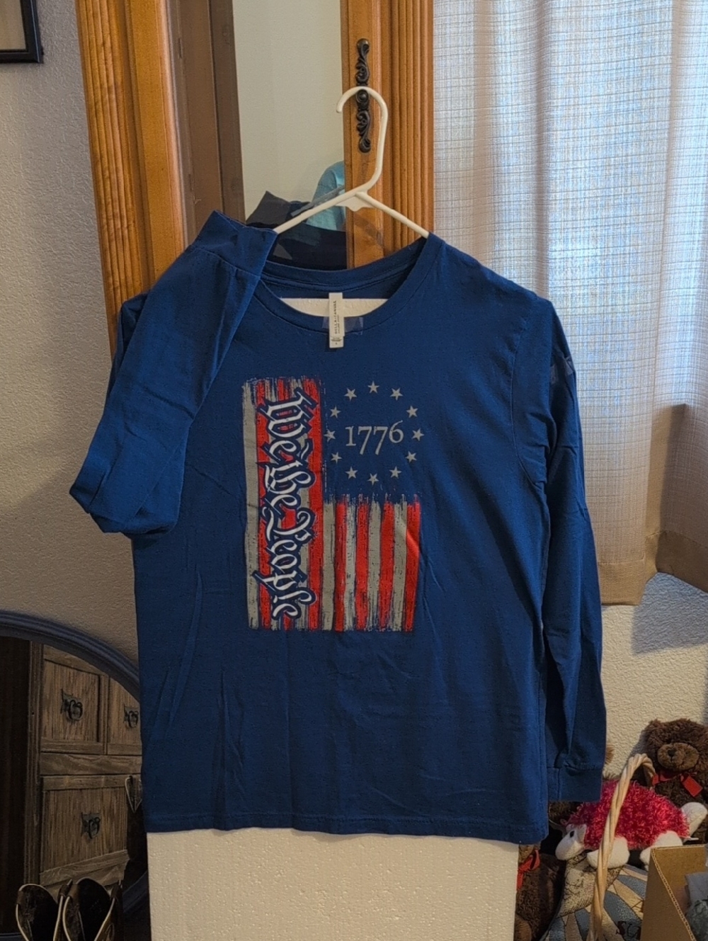 Bella Canvas Men's Blue Long Sleeve Graphic Tee with Red and White Flag Design